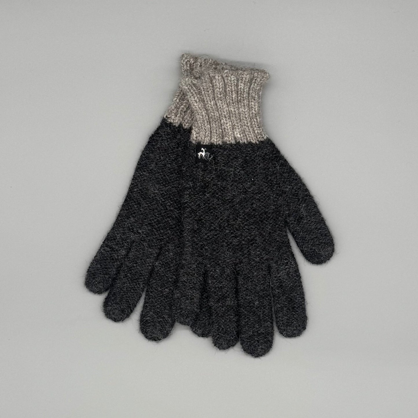 Baby-Alpakawolle Handschuhe Herren in Schwarz und Beige, weich und warm für große Hände.