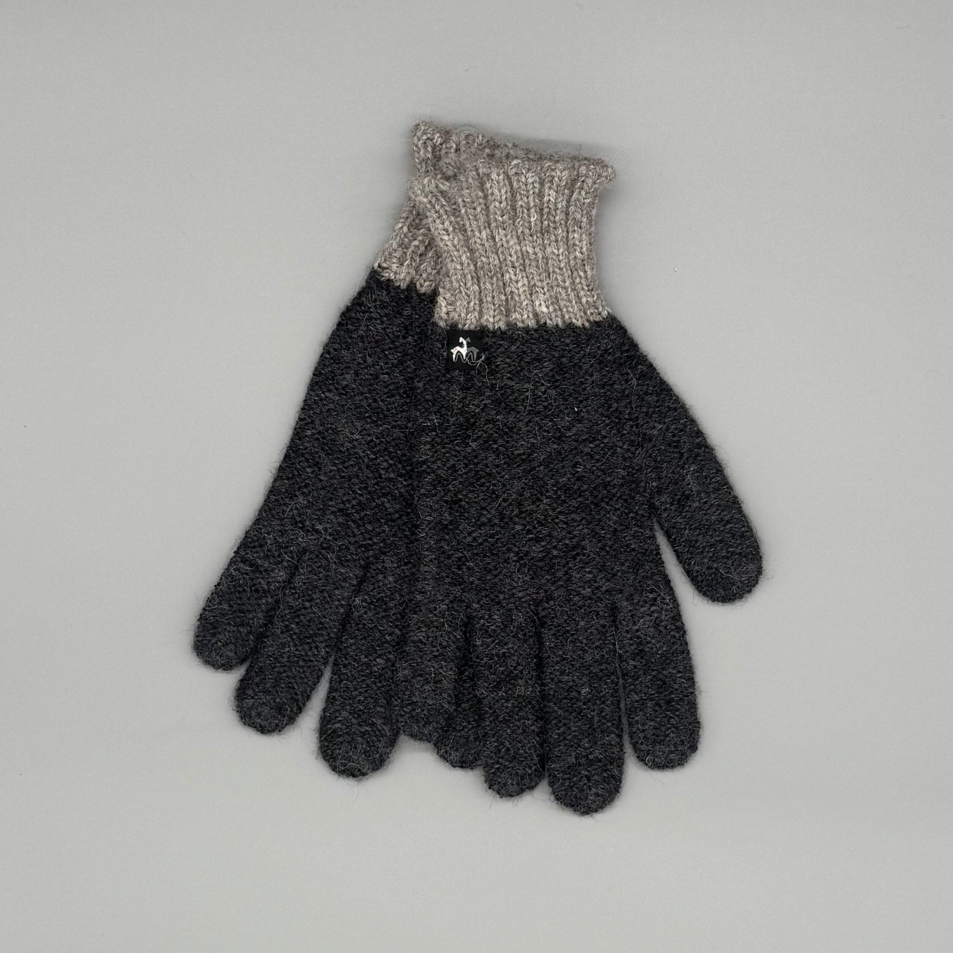 Baby-Alpakawolle Handschuhe Herren in Schwarz und Beige, weich und warm für große Hände.