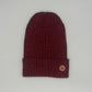 Weiche Beanie aus Baby-Alpakawolle in Rot mit Umschlag und Logo, ideal für Damen und Herren.