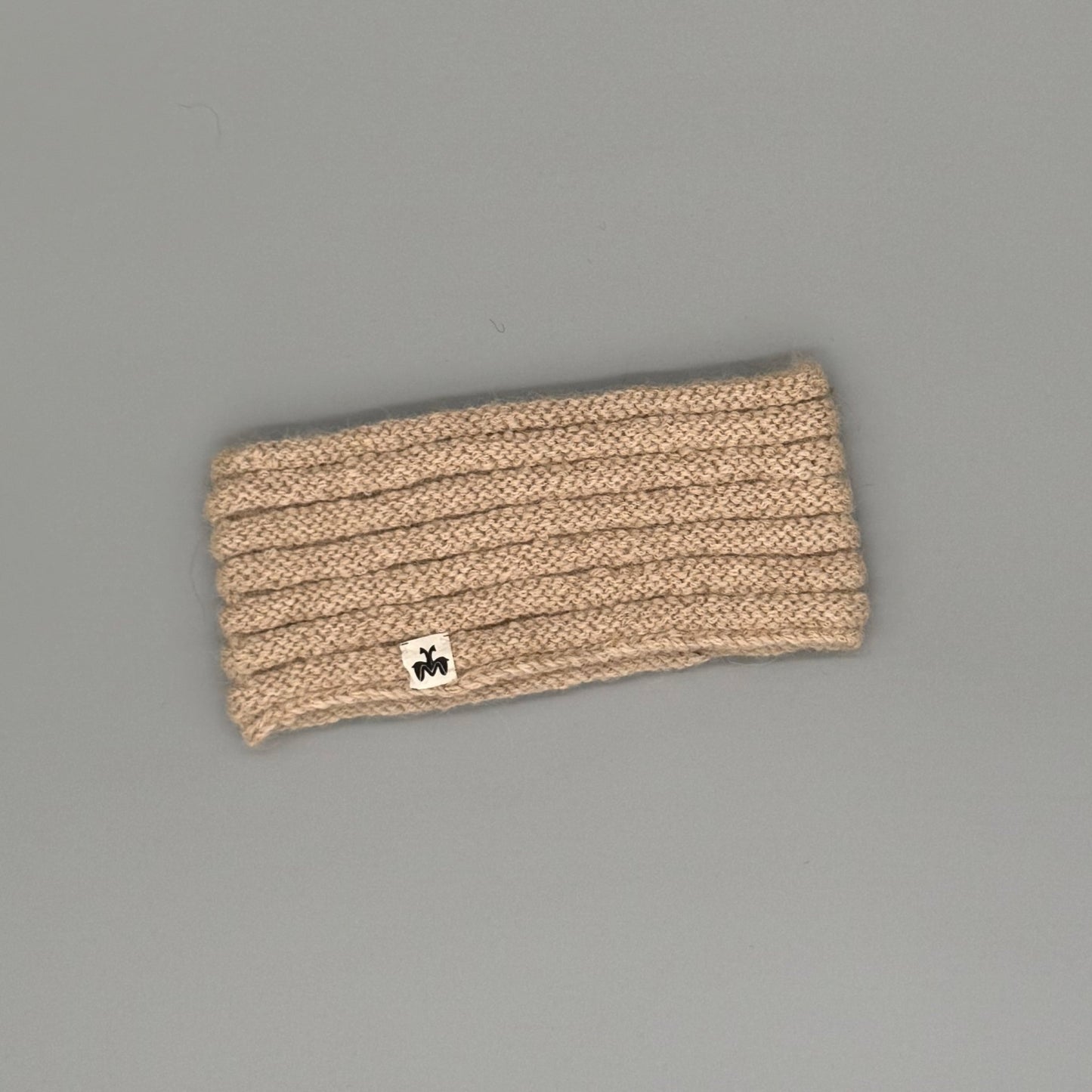 Alpaka Stirnband aus 100% Baby Alpaka in Röllchenmuster, extra warm und weich für kalte Tage.