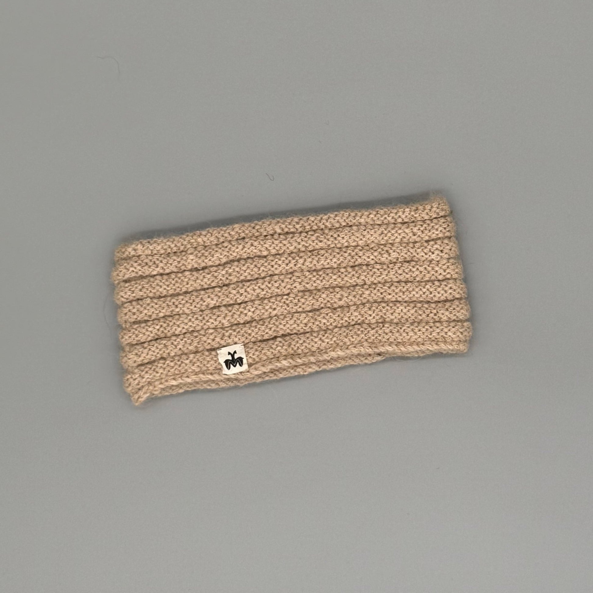 Alpaka Stirnband aus 100% Baby Alpaka in Röllchenmuster, extra warm und weich für kalte Tage.