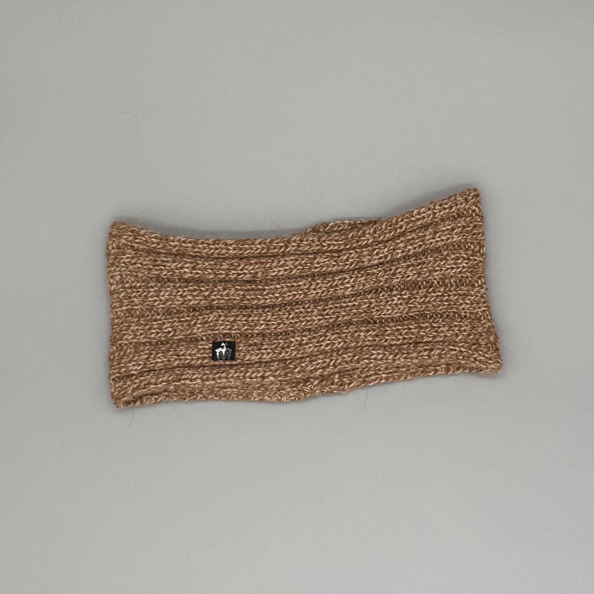 Alpaka Stirnband aus 100% Baby Alpaka in Röllchenmuster, extra warm und weich für kalte Tage.