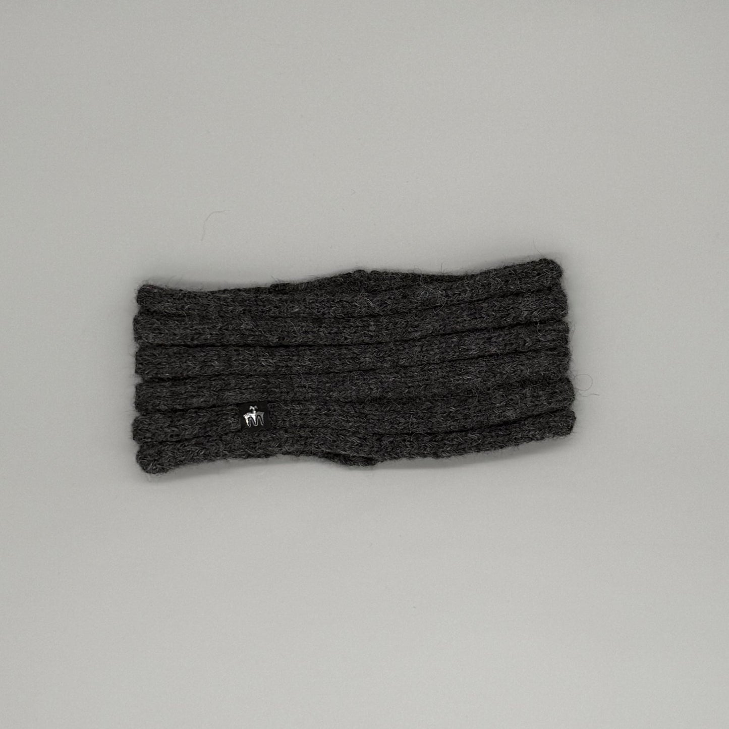 Alpaka Stirnband aus 100% Baby Alpaka in Dunkelgrau, dick gestrickt und extrem warm.