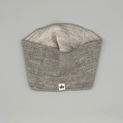 Alpaka Stirnband in grau, aus 100% Babyalpaka Wolle, weich und kratzfrei für ultimativen Komfort.