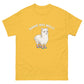 Lustiges Cartoon T-Shirt mit Alpaka und dem Spruch 'Komme was Wolle' in Gelb für Tierliebhaber.