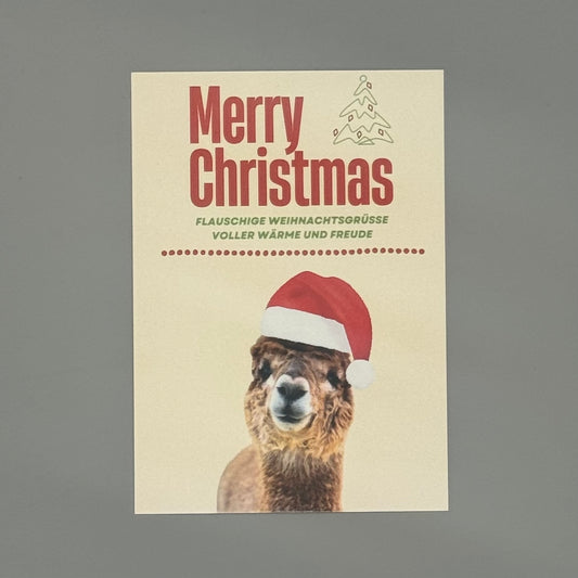 Weihnachtskarte mit süßem Alpaka-Motiv – Merry Christmas Postkarte mit Alpaka Greta